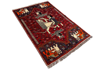 Rug 131x88 cm, shown diagonally: red pattern with animal motifs and a frayed edge