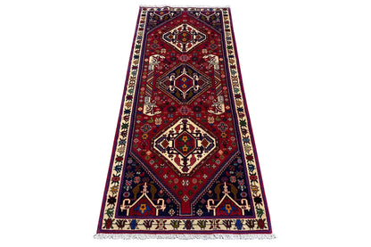 Rug, red and dark blue central pattern with border and fringes, approx. 195x79 cm.