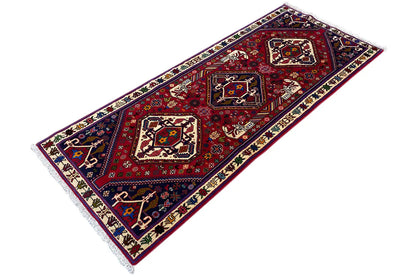 Rug laid flat, blue-red border with medallions, fringes at the corners.