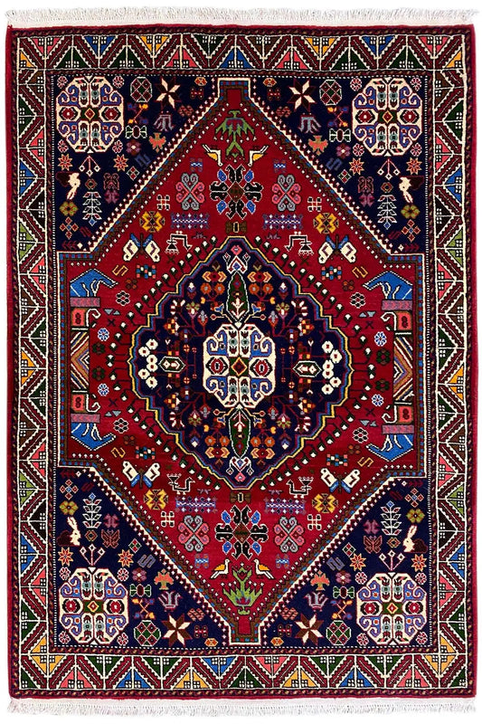 Oriental rug with a red field, dark blue medallions, and a multicolored decorative border