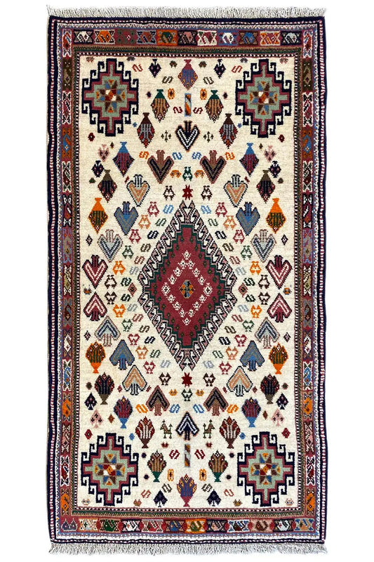 Oriental rug with geometric pattern, cream-colored and multicolored, 137x72 cm