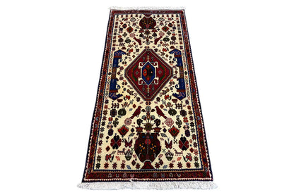 Oriental rug, cream-colored with a red medallion and blue border, fringes, 153x72 cm