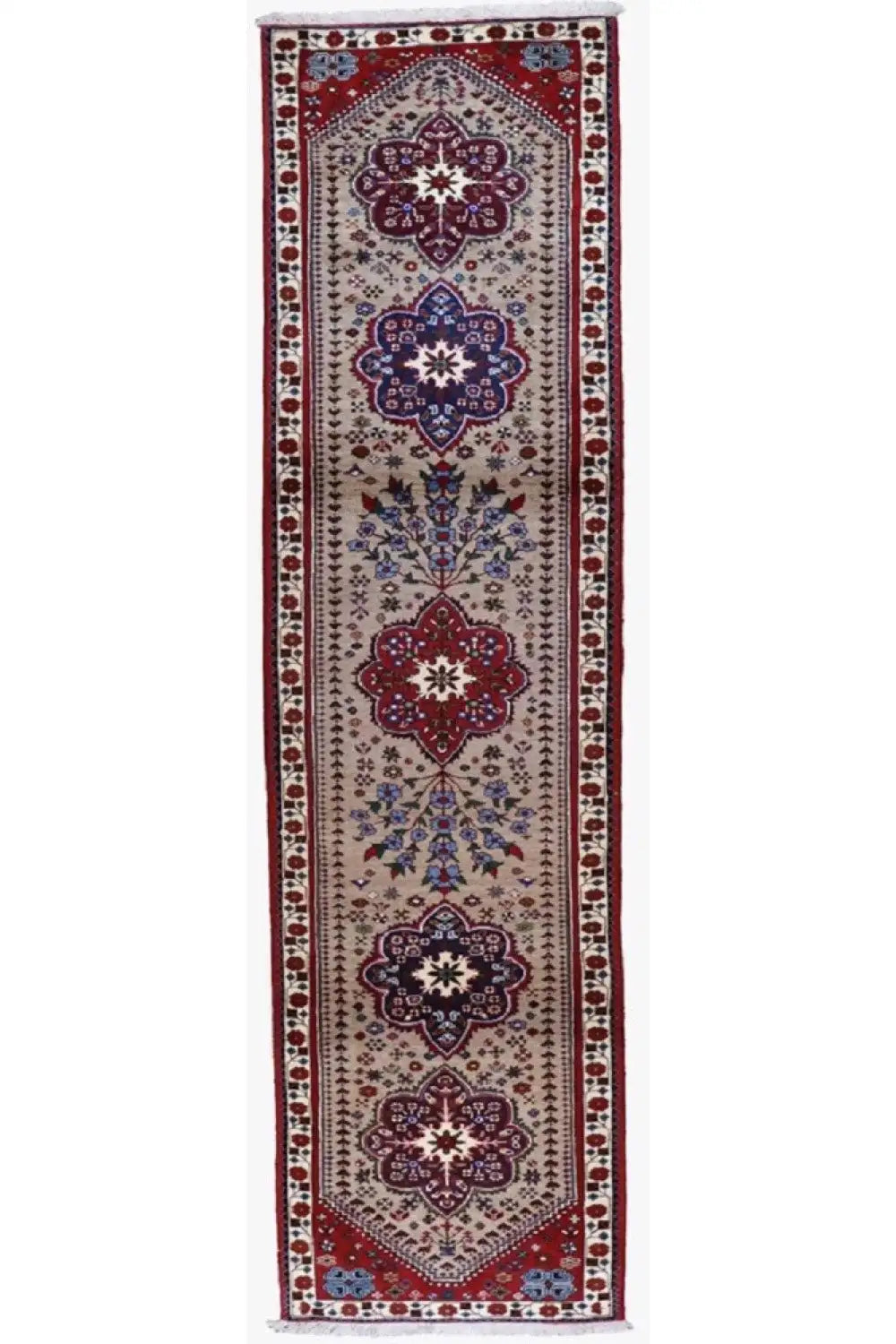 Rectangular runner with a centered medallion pattern in red, blue, and beige