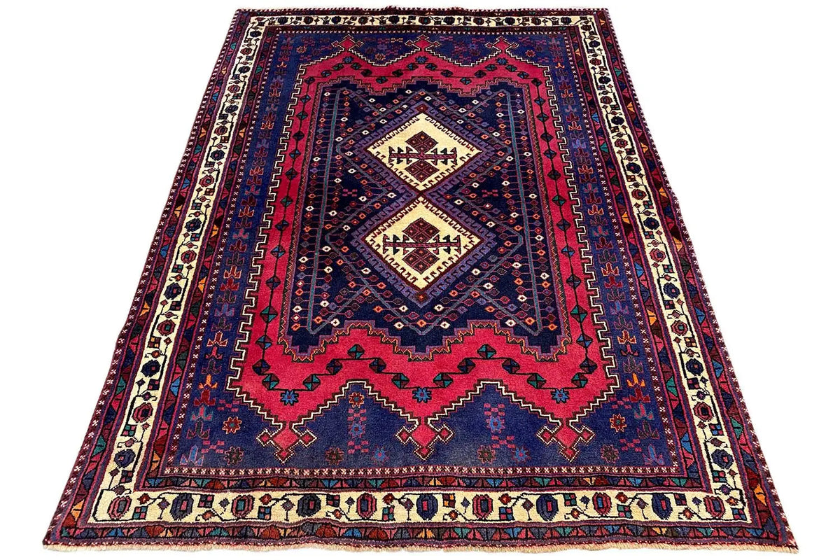 Sirjan rug, triangular perspective, blue-red with a central diamond and decorative borders