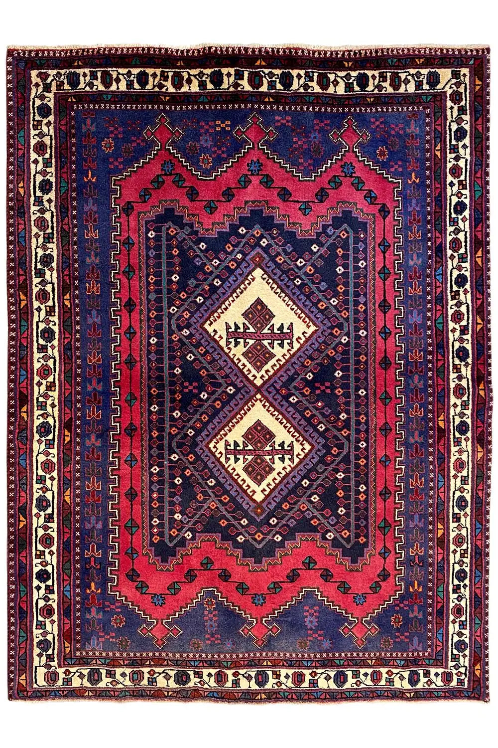 Sirjan rug, front view, blue central medallion with red accents and border