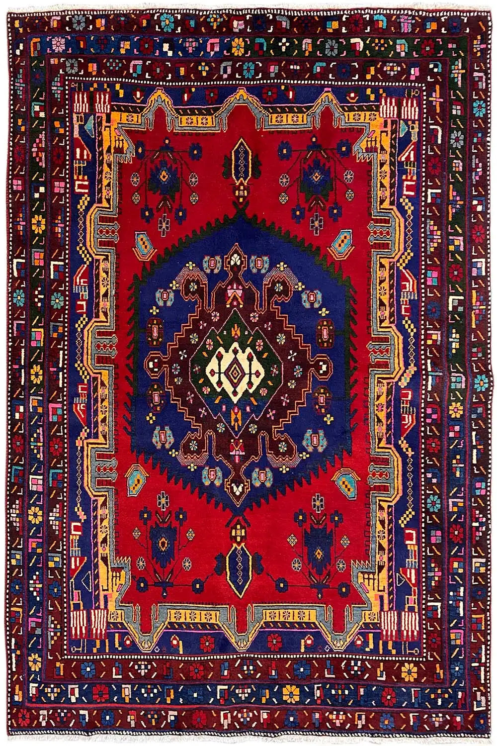 Sirjan rug (250×166 cm) in red, blue, and beige with a large central medallion