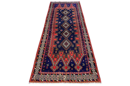 Sirjan runner viewed at an angle, blue with a red border and geometric ornamental pattern.