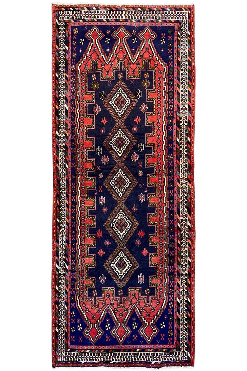 Sirjan runner, blue rug with a red and black ornamental pattern, rectangular.