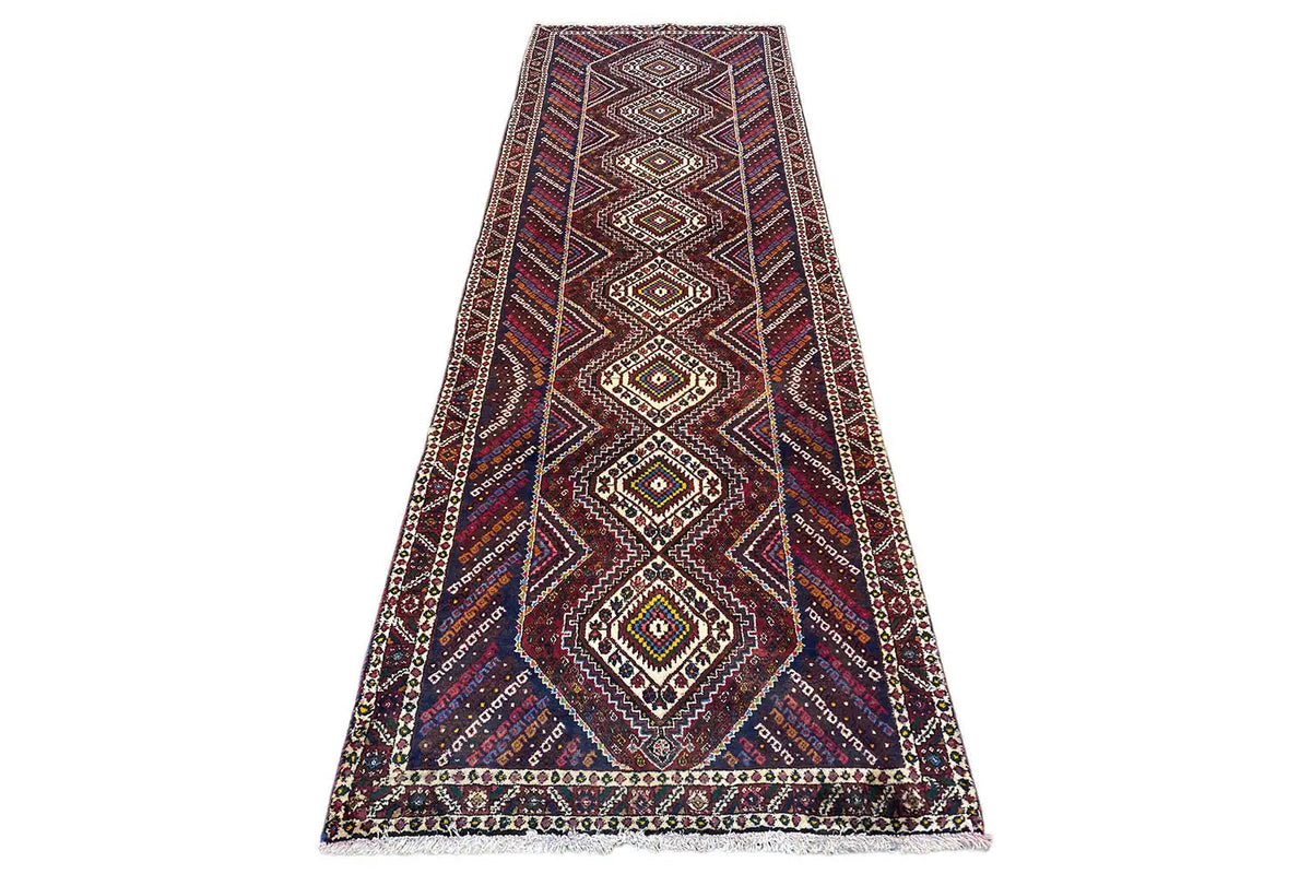 Sirjan runner, wide rectangular, multicolored diamond pattern with a dark decorative border