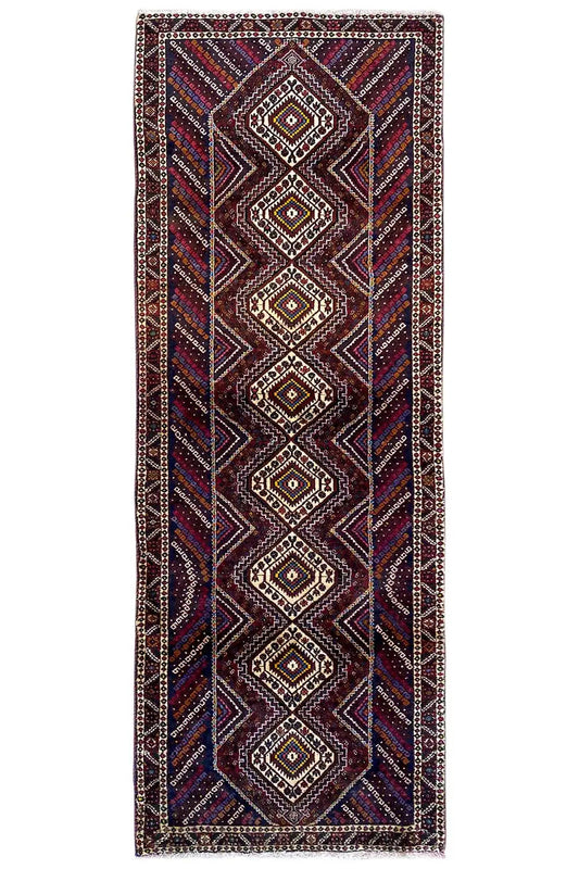 Sirjan runner, rectangular, geometric diamond pattern with a border in shades of red, blue, and cream