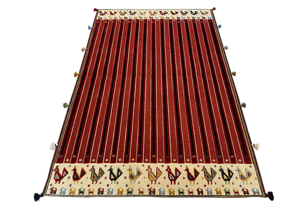 Soumakh rug with reddish-brown stripes, cream-colored lower edge with a pattern and tassel trim
