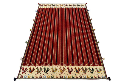 Soumakh rug with reddish-brown stripes, cream-colored lower edge with a pattern and tassel trim