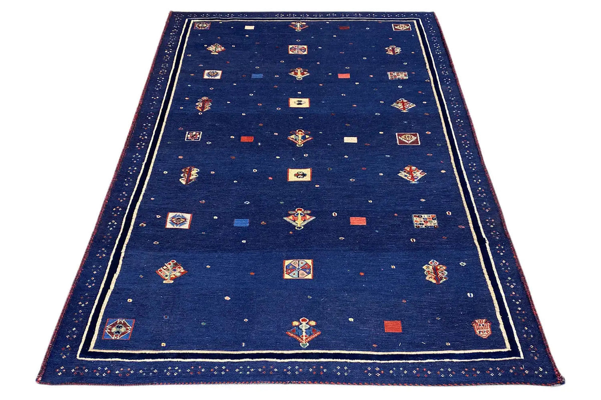 Soumak rug 177x118 cm, dark blue: central motifs with a narrow double border