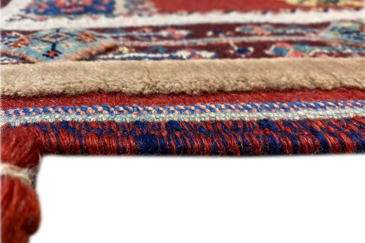 Runner fringe and selvedge: multicolored pile, beige base, red-blue pattern
