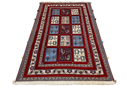 Carpet with a red central field, multi-row border in blue and beige, fringes