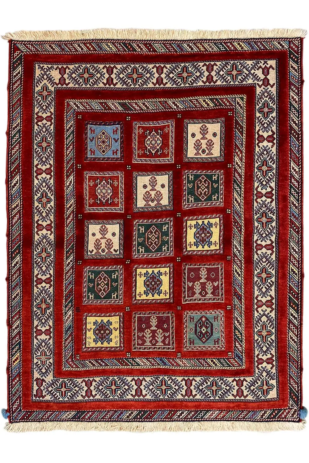 Square Oriental rug with a red central field and geometric ornamentation