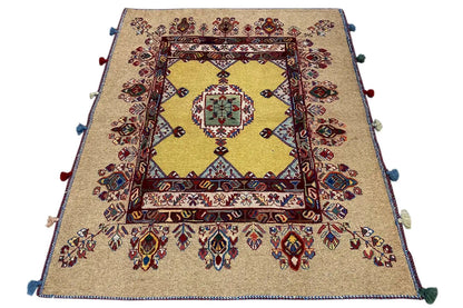 Soumakh rug 120x100 cm viewed from above: beige base with border, decorative frame, and corner tassels