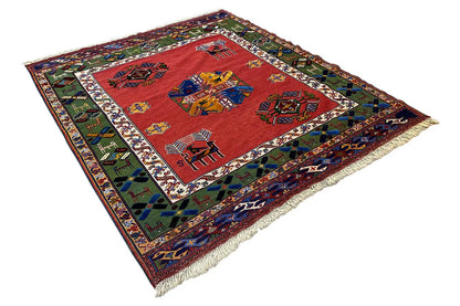 Carpet with a red ground, ornamental panels, a multicolored border, and fringes