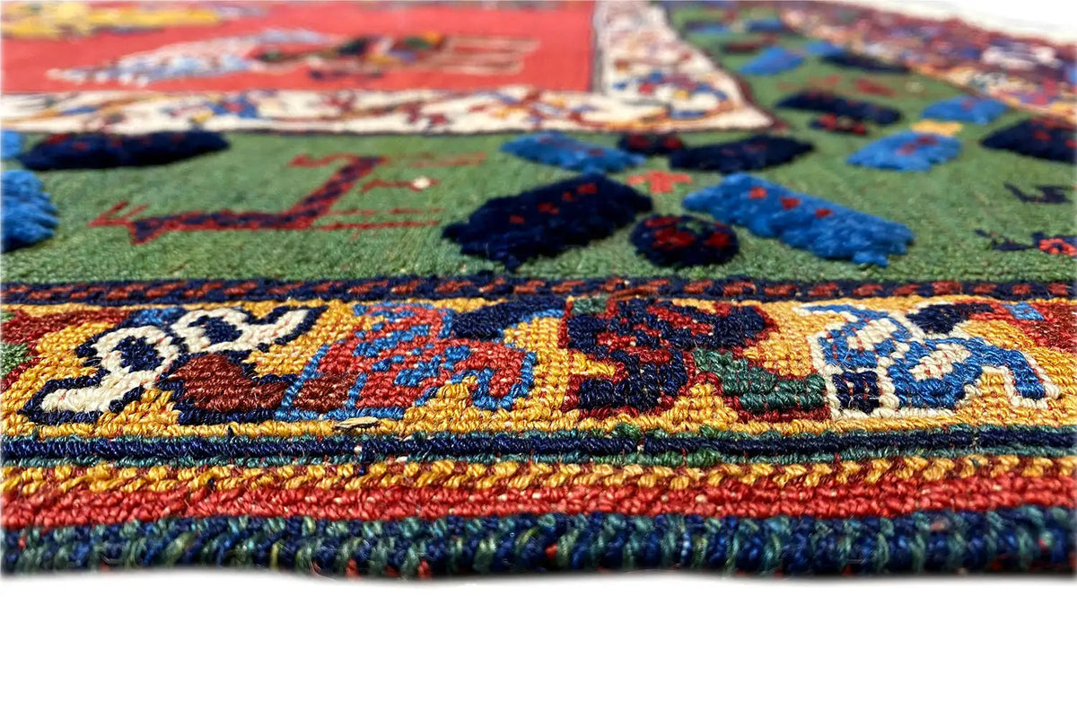 Close-up: colorful carpet patterns with colored threads and a multicolored border texture