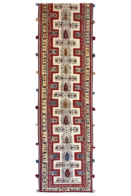 Oriental rug runner, narrow design, cream-colored base with a red pattern and fringes