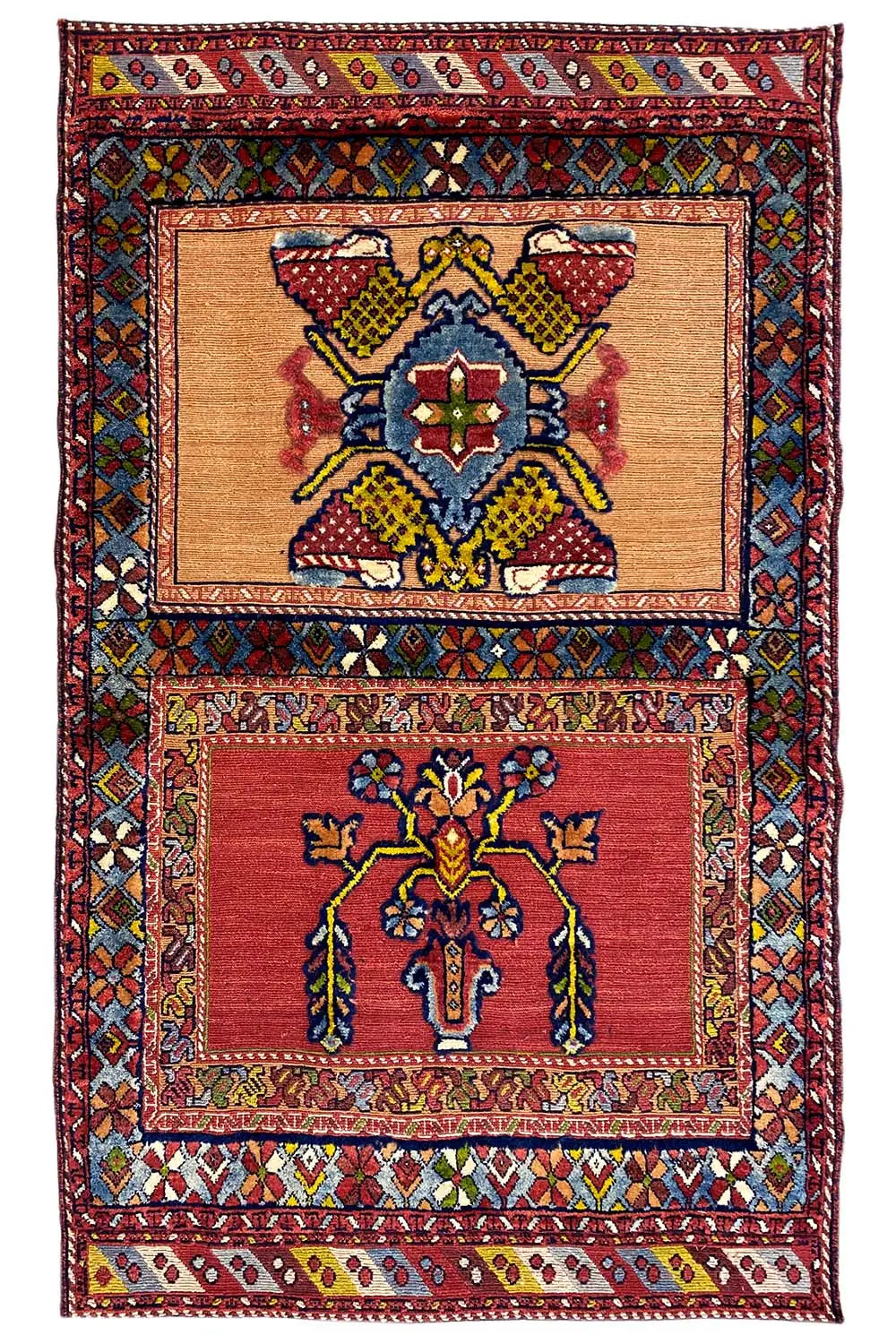 Oriental rug with a red ground, two rectangular ornamental fields, and multicolored borders, 135x83 cm