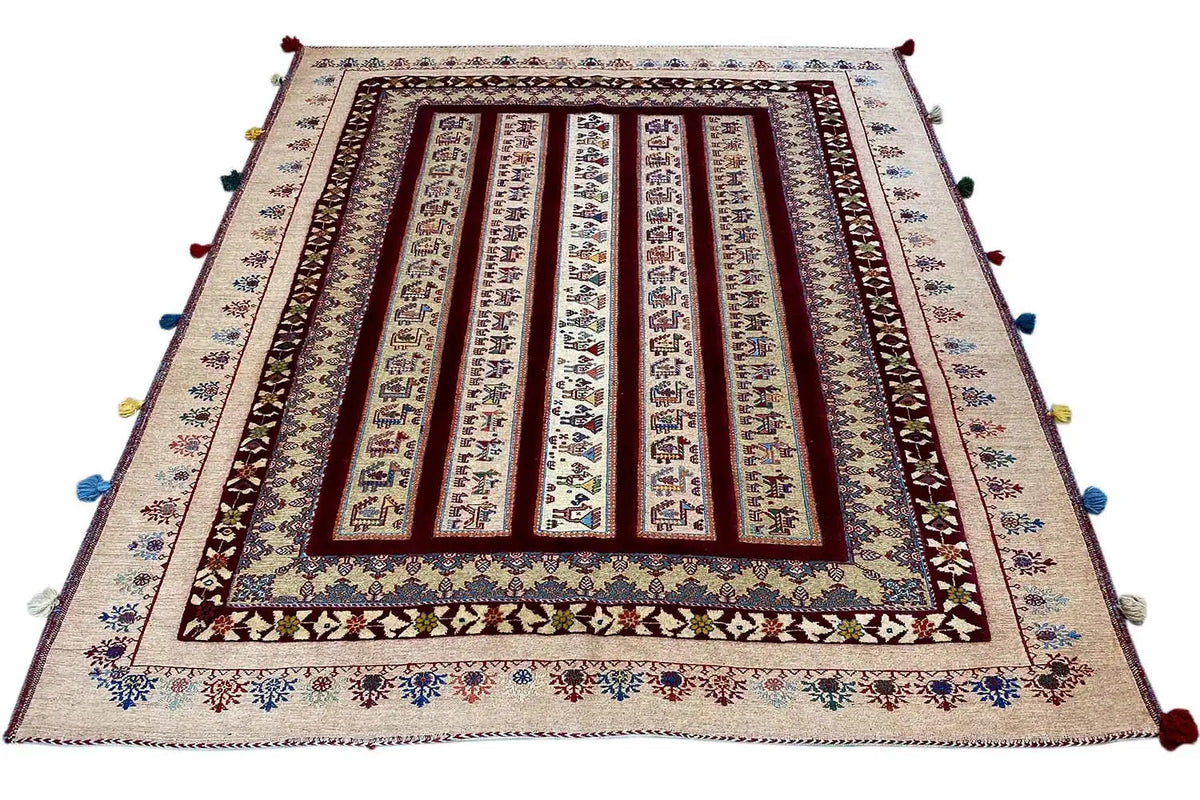 Soumak rug with a central framed pattern, beige background, multicolored tassels at the corners