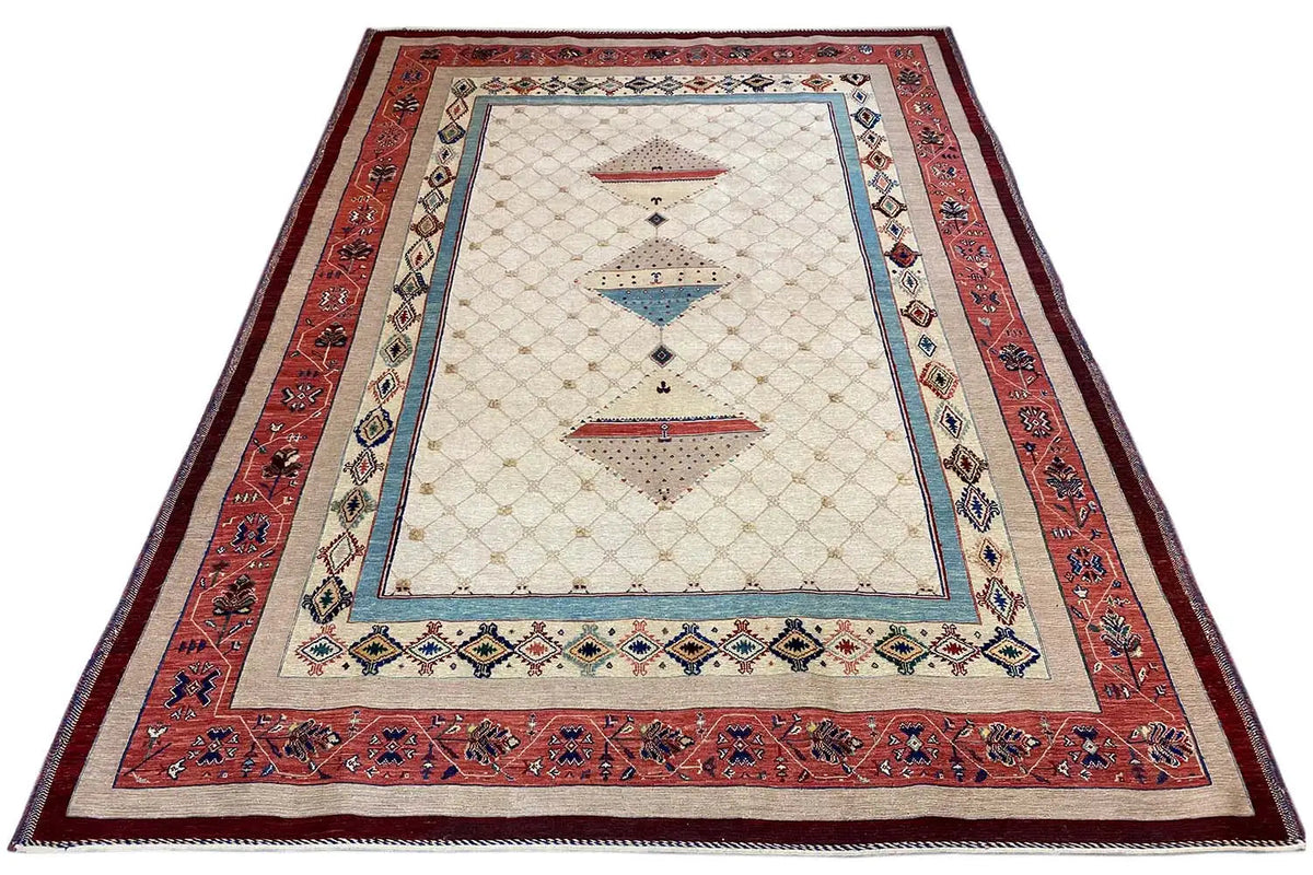Rug laid flat: red inner border, beige field with blue decorative element