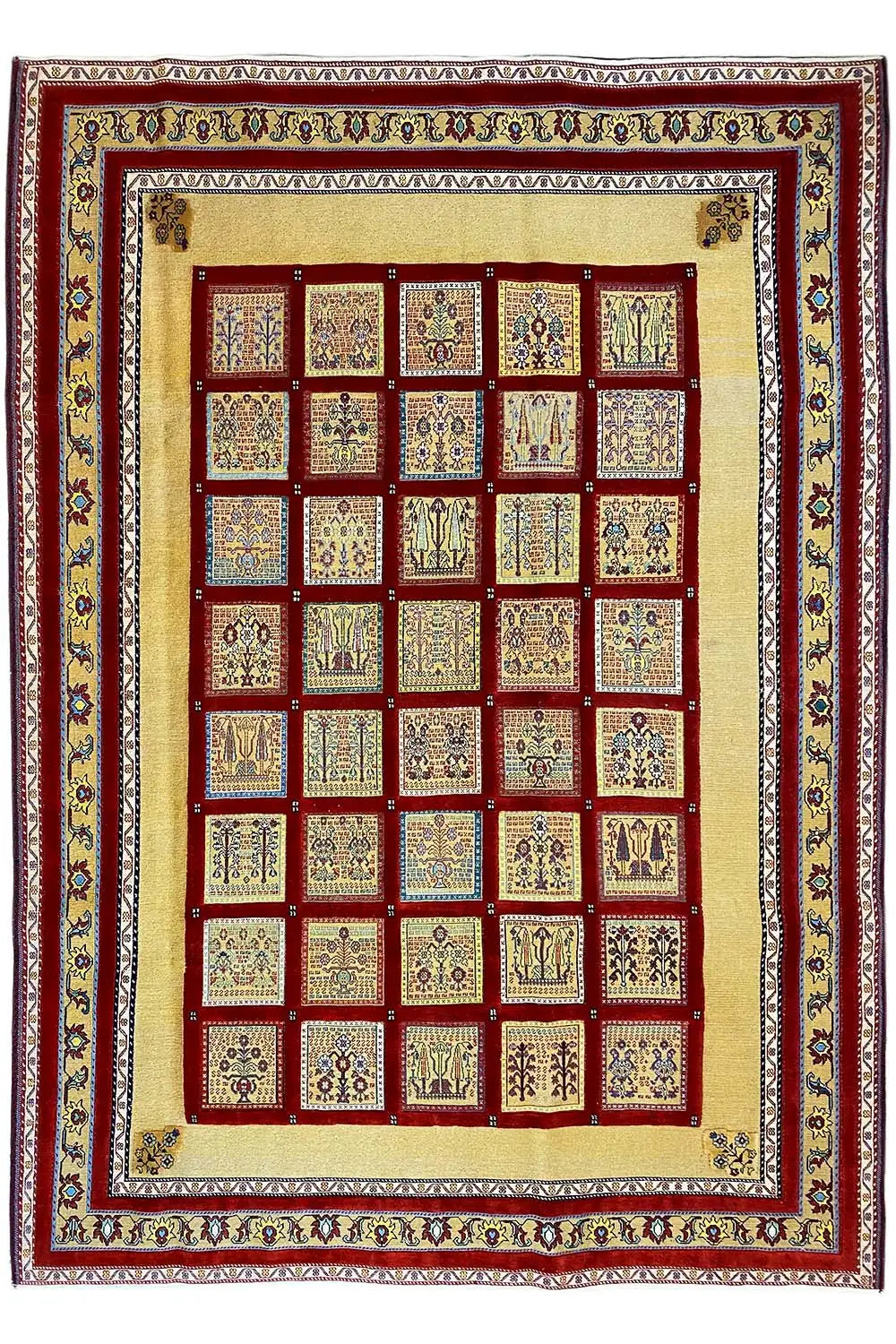 Rug with a central tile pattern, red and beige, multicolored border