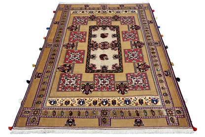 Large oriental rug: patterned center, borders, and fringes around the edge