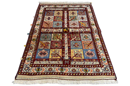 Soumak rug, front view, multicolored red grid pattern with border and fringes