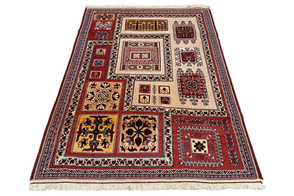 Rug 161x119 cm with a red border, central decorative panels, and fringe along the edge.