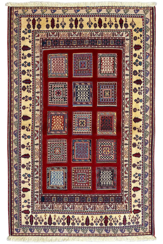 Soumak rug 156x101 cm with a red central field featuring squares, a border, and decorative stripes.