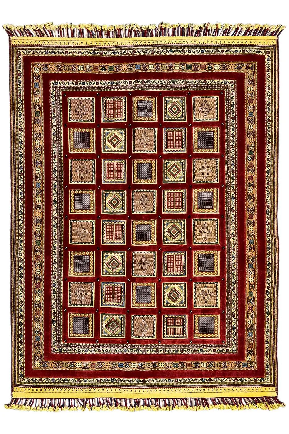 Rug with a red center and beige-brown checkered pattern, gold-colored border, fringes