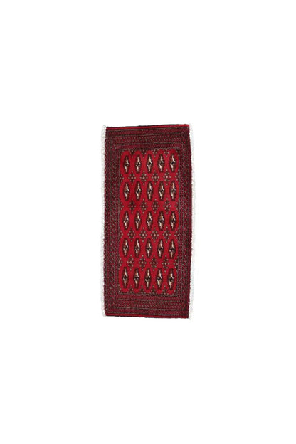 Poshti Turkmen carpet, narrow rectangle with a red field and diamond ornaments
