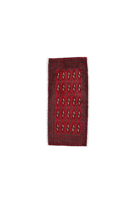 Poshti Turkmen carpet, narrow rectangle with a red field and diamond ornaments