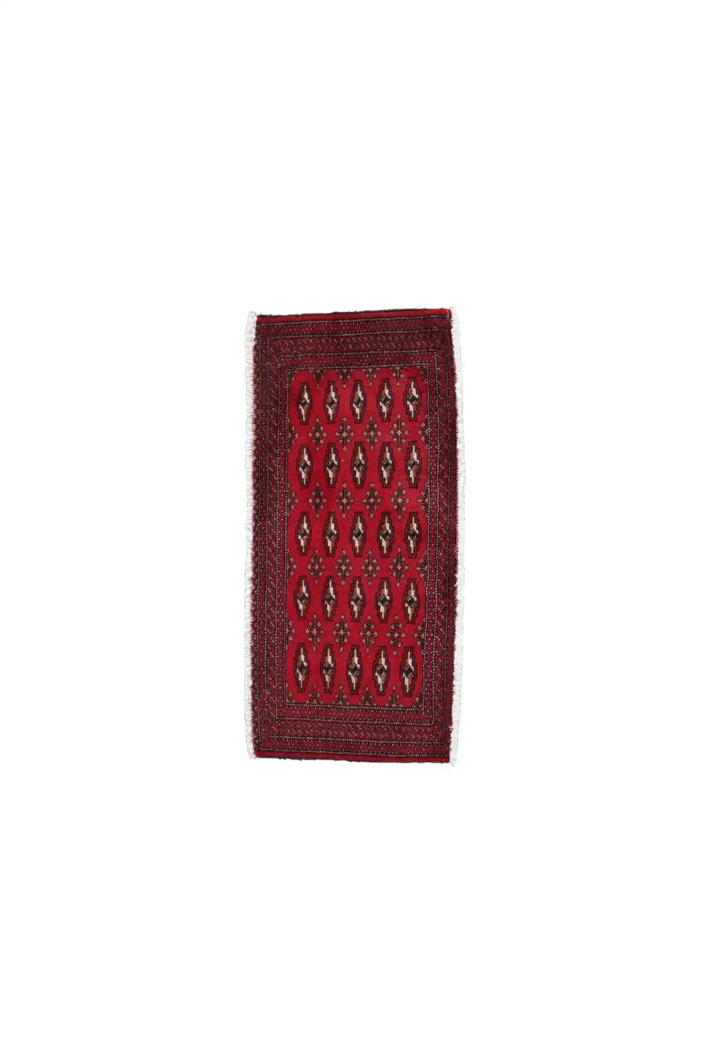 Turkmen carpet narrow section: red patterned field with a geometric design in dark blue