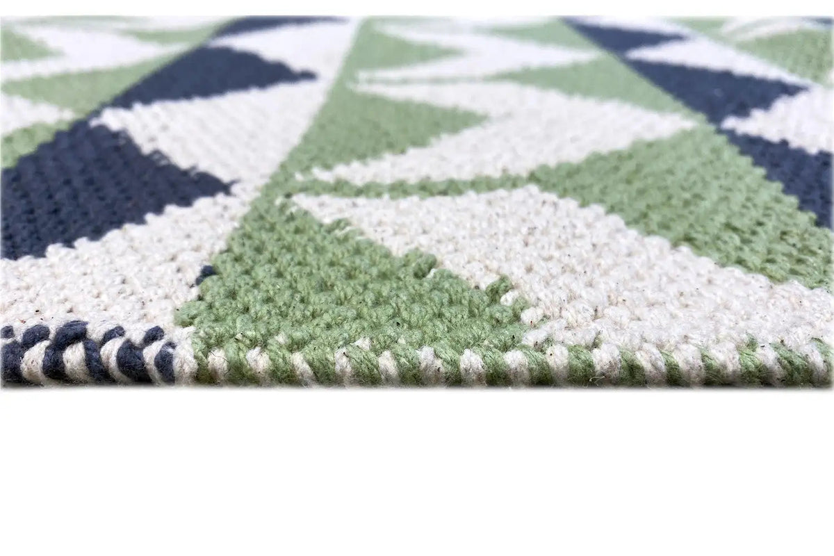 Kilim rug with short pile and geometric stripes in green, blue, and white