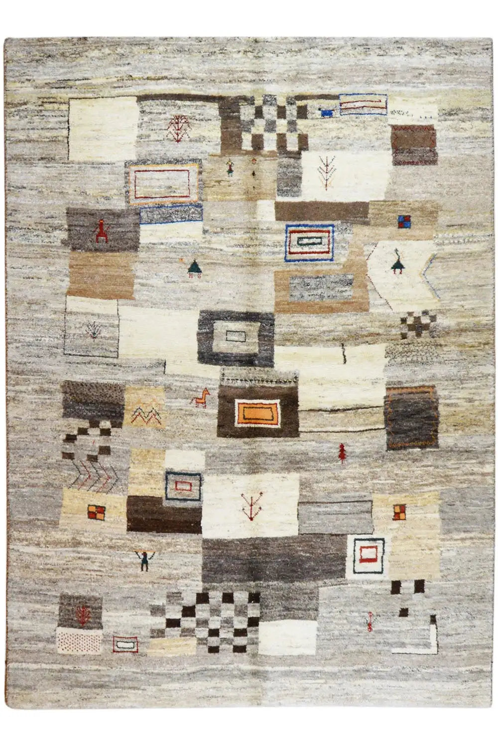 Rectangular rug with an abstract block pattern in beige, gray, and dark accents