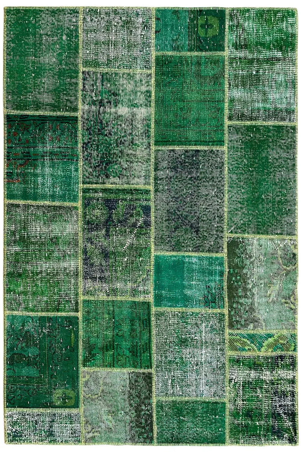 Patchwork rug: green and beige patchwork pattern in many rectangles and squares.