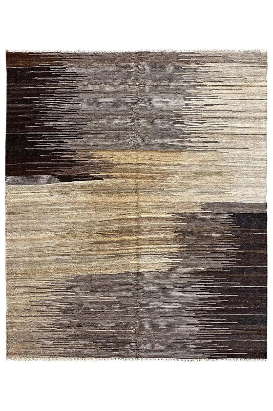 Kilim rug with horizontal bands of color in gray, beige, and dark brown.