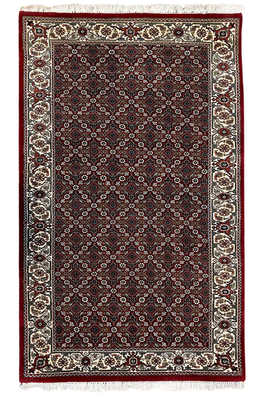 Bidjar rug (141x81 cm), rectangular, with a dark central field and a cream and red border