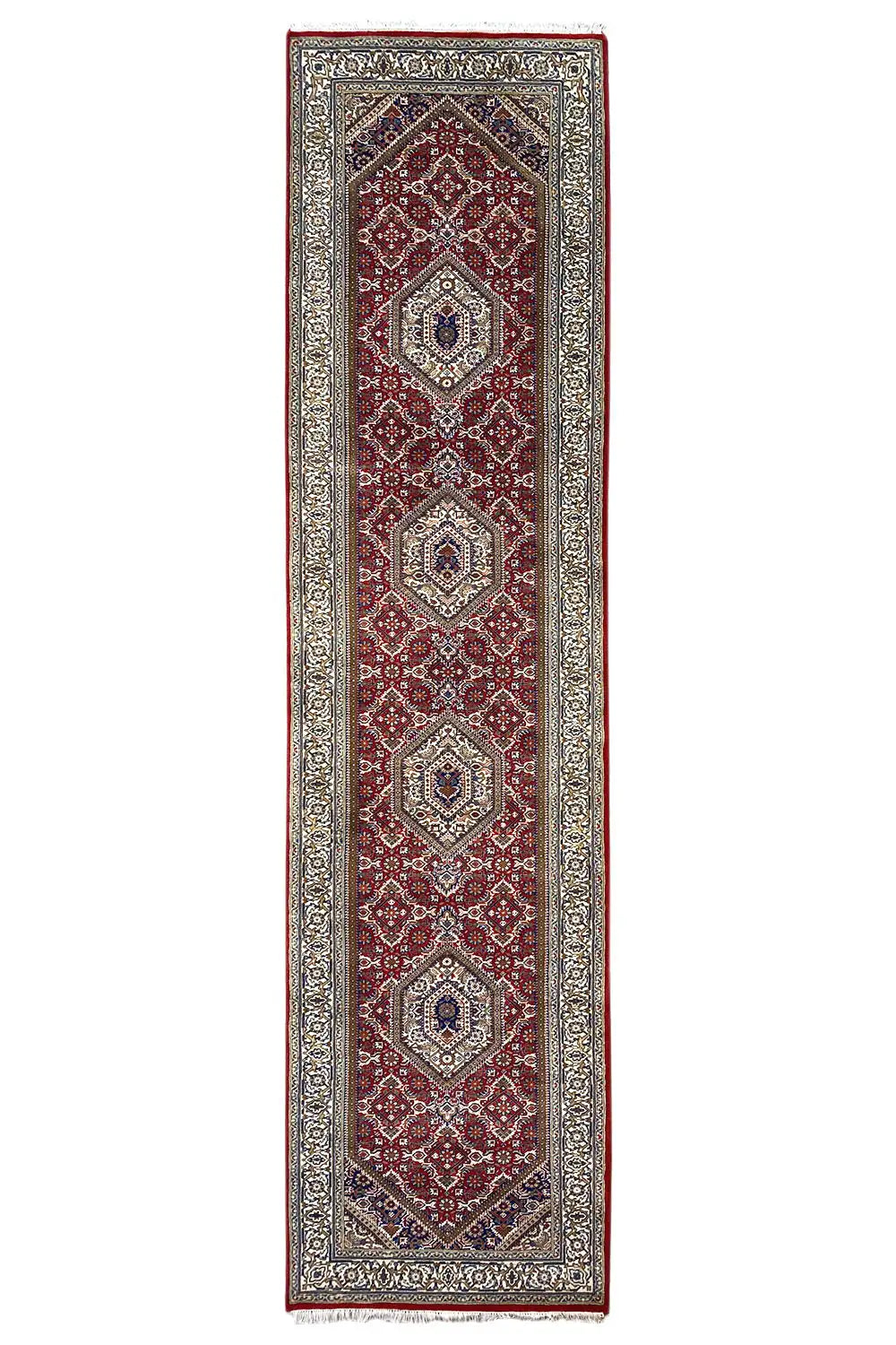 Bidjar runner with a red border and medallion pattern, dark central stripe