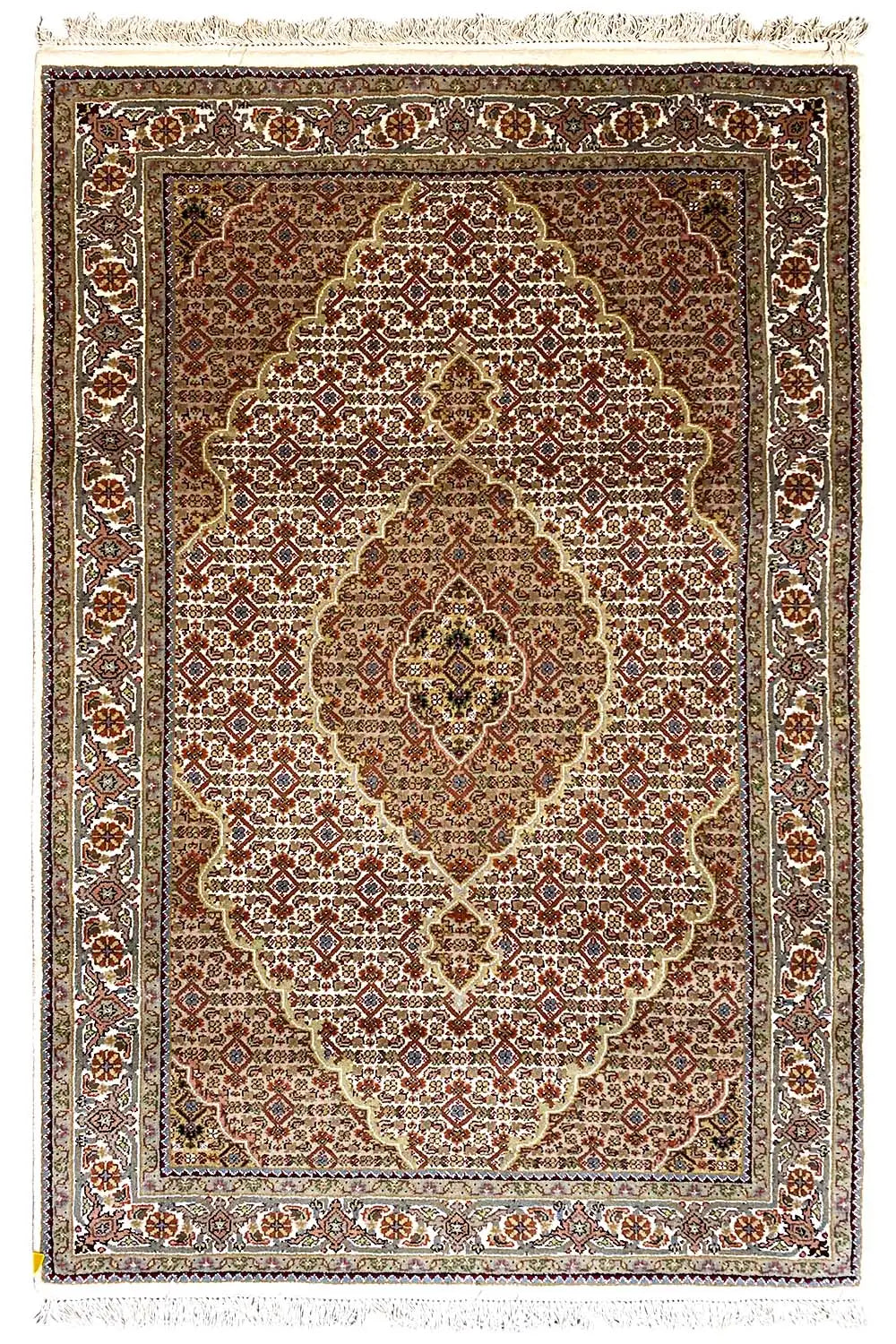 Oriental rug with a central medallion, brown and beige pattern, and fringes all around