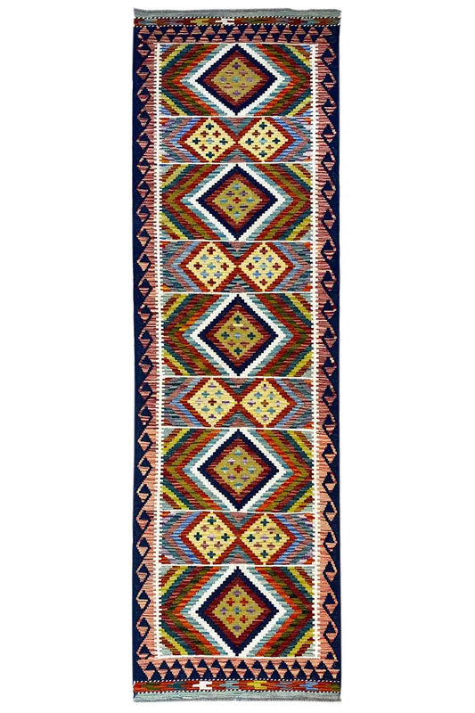 Kilim Afghan runner with a geometric diamond pattern and colorful borders, rectangular