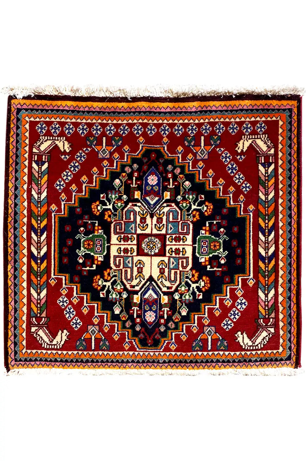 Square Oriental rug with a black center, burgundy border, and symmetrical ornamental pattern
