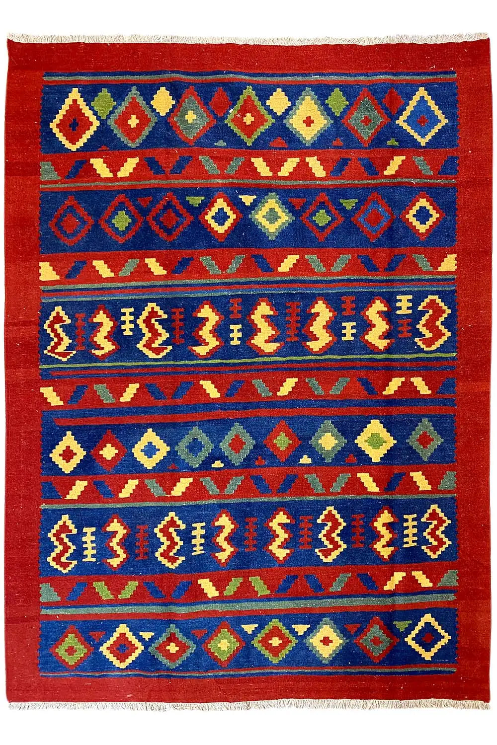 Kilim rug with a red background, stripes, and colorful diamonds