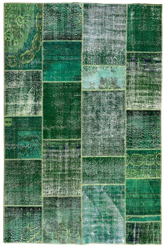 Patchwork rug with a square patch pattern in green and light green