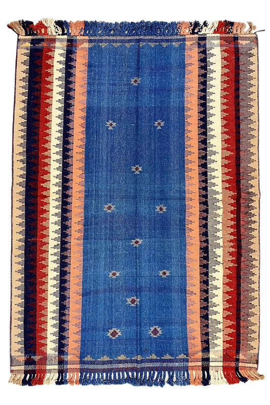 Rug with a central blue stripe and surrounding red, beige, and white stripes