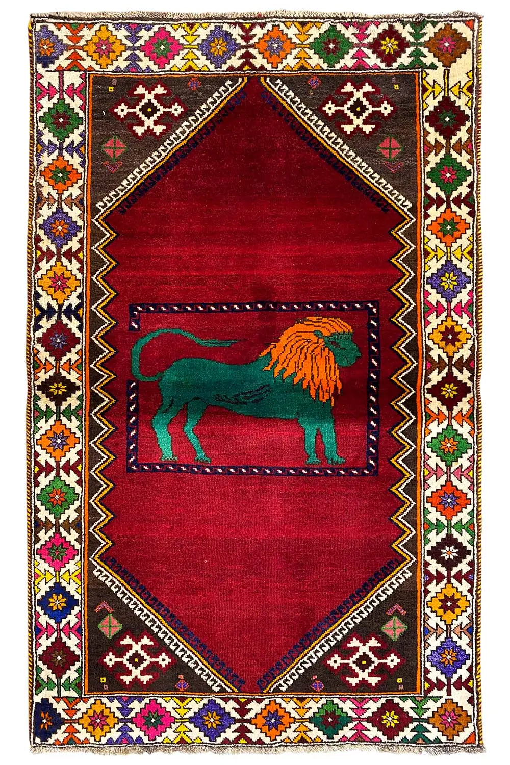 Gabbeh rug with a red background, a central lion motif, and a colorful ornamental border