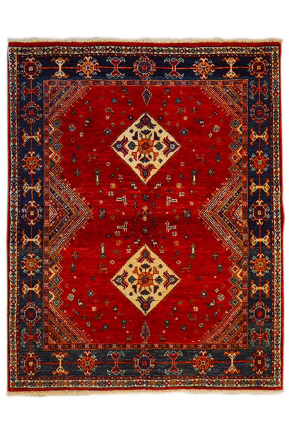 Red carpet with a blue border and two central diamond medallions